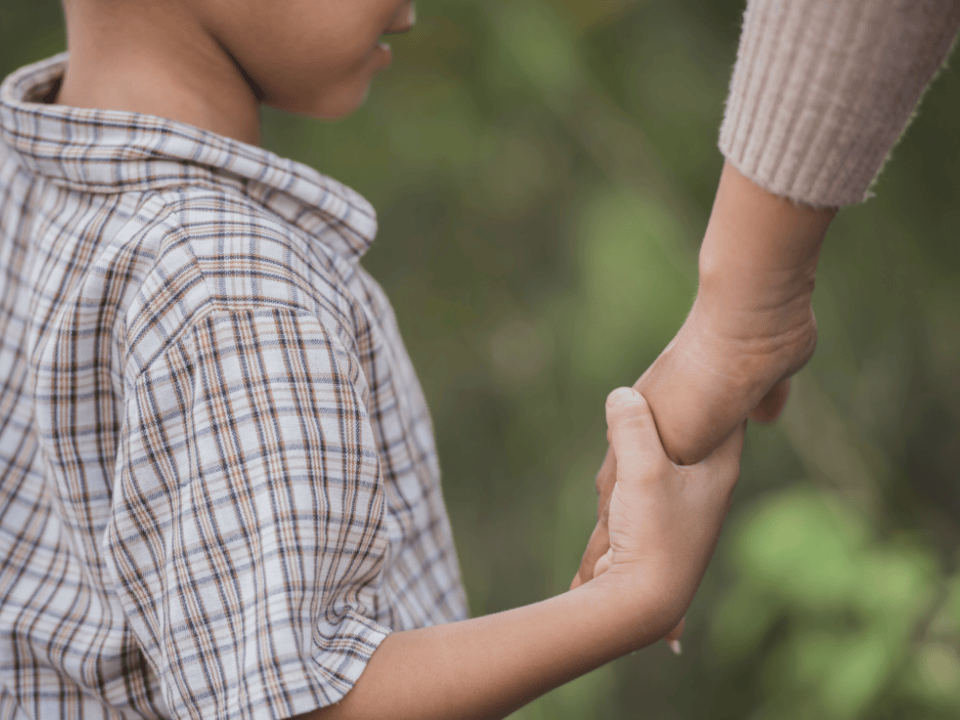 Mother and Son holding hands- Nicolata Bratosin Canva Pro Image